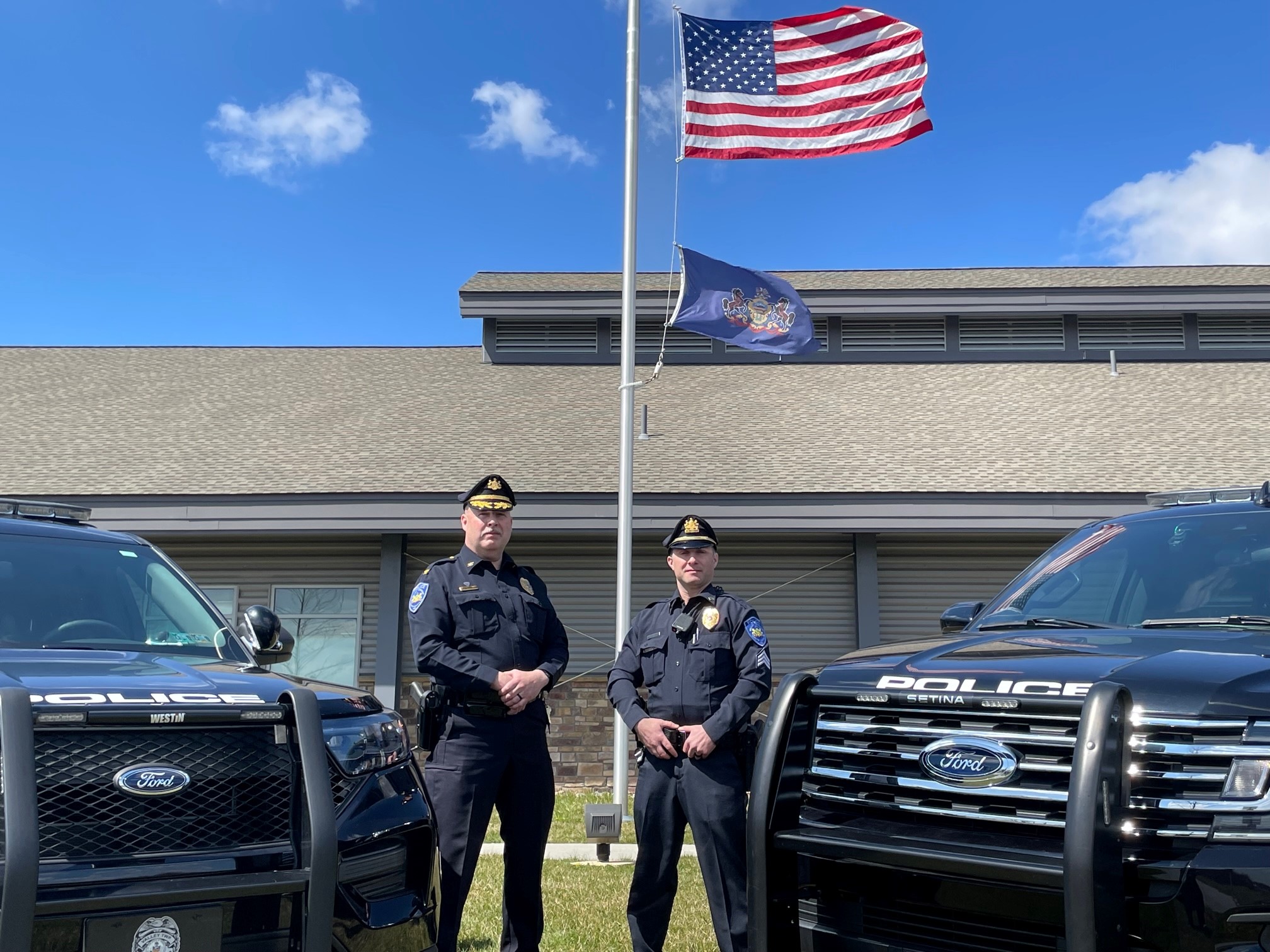 Chief Eckman and Sergeant Parker with Valley Township Police Department Cars