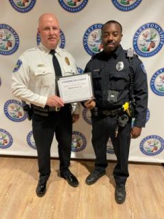 Chief Eckman Presenting Office Green with a Commendation