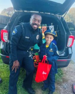 Officer Green at Rainbow elementary Trunk or Treat Halloween Event