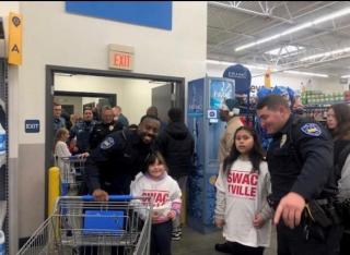 Officer Green and Officer Shear Shop with a Cop Event with Valley Resident Kids